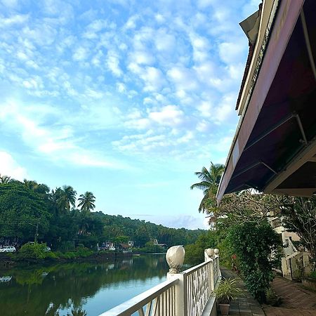 Hotel Riverside Baga Extérieur photo