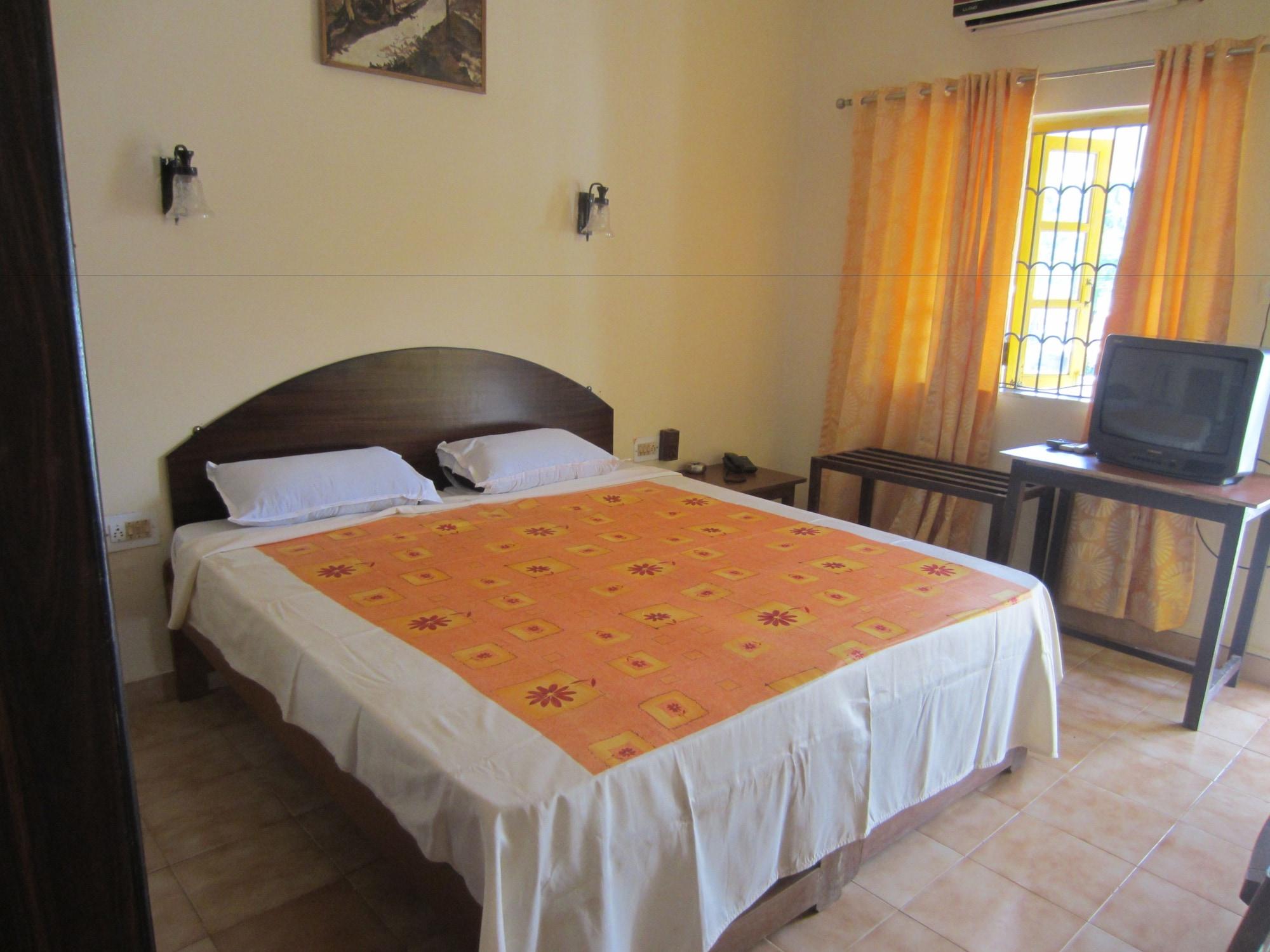 Hotel Riverside Baga Extérieur photo