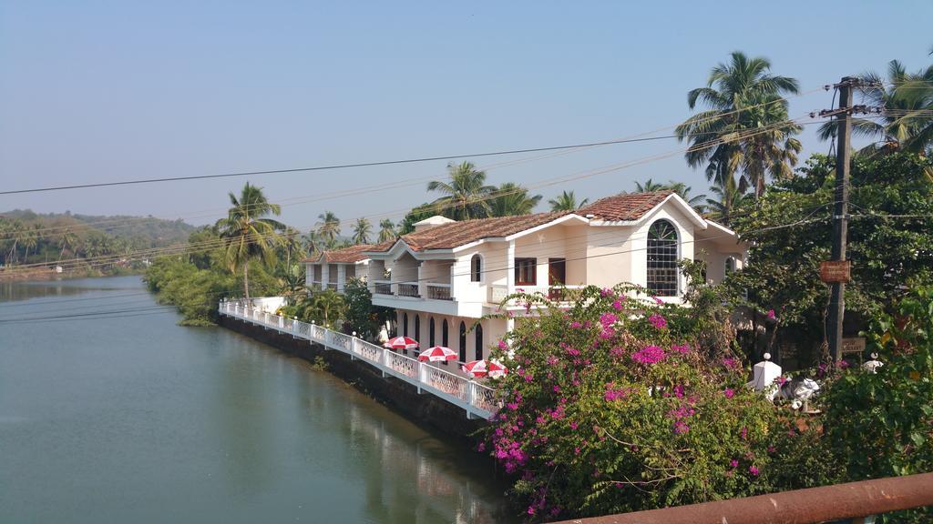 Hotel Riverside Baga Extérieur photo