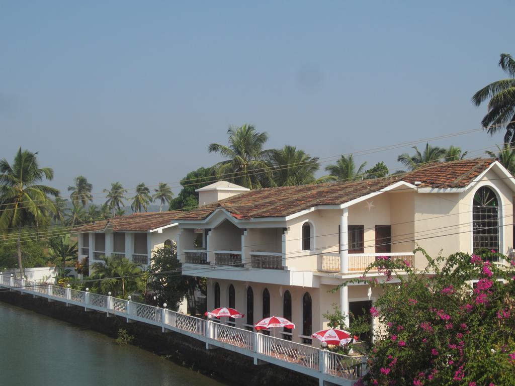 Hotel Riverside Baga Extérieur photo